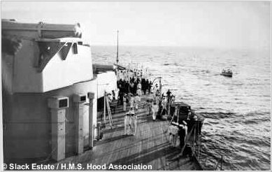 A seaboat rowing to reach H.M.S. Hood