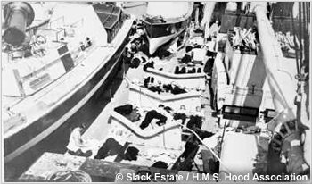 Crewman relaxing on H.M.S. Hoods shelter deck, circa 1937