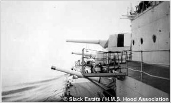 H.M.S. Hoods forward main guns trained to port, circa 1937
